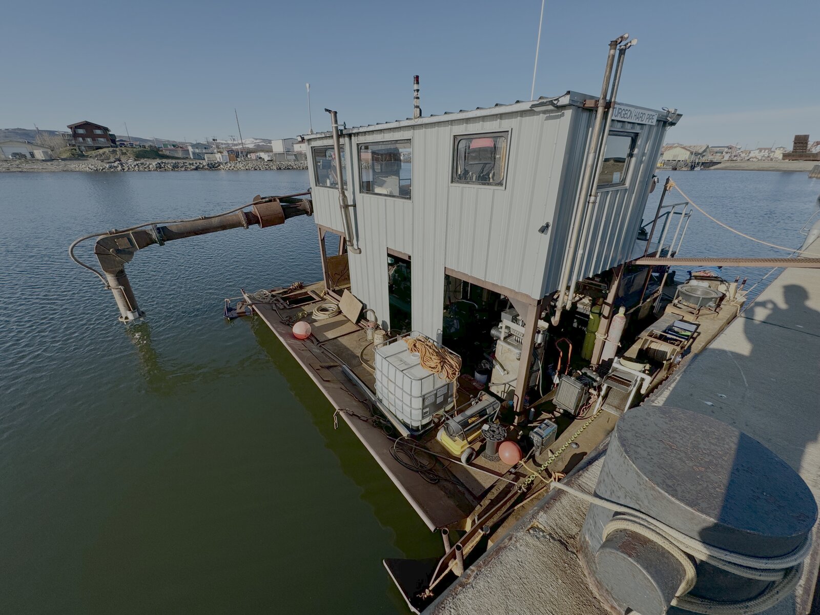 Sturgeon Mining dredge operating on the water
